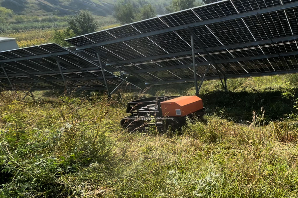 track lawn mower for solar farm